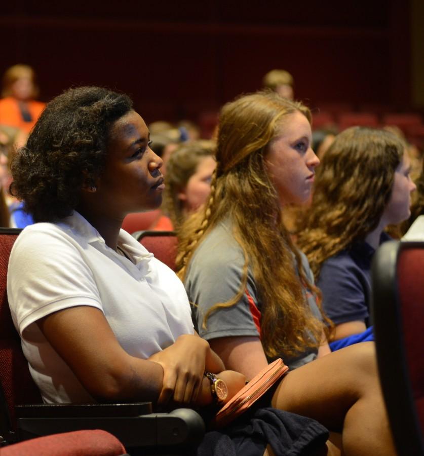 Prep juniors Amber Mabry, McKenzie Robinson, and Claire McGehee listen to the symposiums speakers. Photo courtesy of Ms. Vicki King.