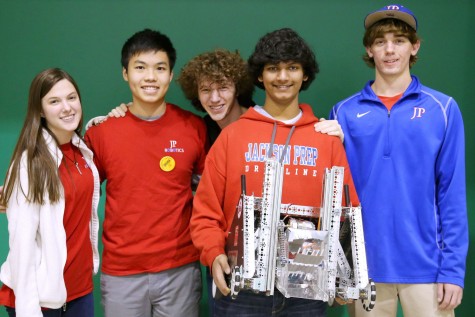 Leah Thomas, Jack Huang, Daniel Palmer, Joshua Michael, and Isaac Clapp, with JP robot. (photo courtesy of Mr. Clay Conn)