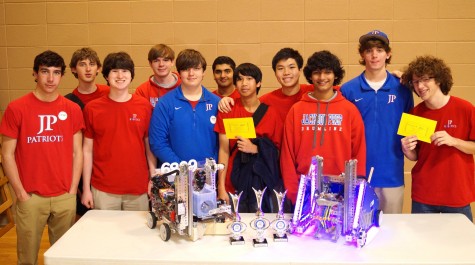 Robotics team and their robots