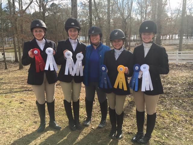 Jackson Prep Equestrian team members smile after another successful show. Pictured from left to right are Miranda Davis, Gayle Grantham, Mandi Powers, Miriam Berry, and Sarah Riley Jicka. Photo courtesy of Sarah Riley Jicka