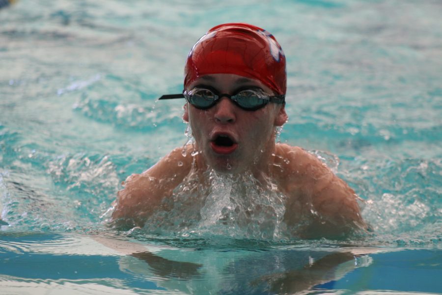 Sophomore Will Mann swims the breaststroke. Photo by Stewart McCullough.