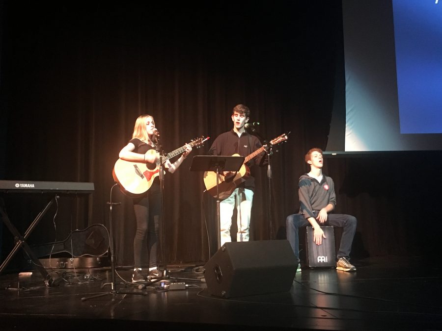 (left to right) Maclain Kennedy, Wesley Roberson, and Jennings Duncan lead worship. Photo by Chatham Kennedy 