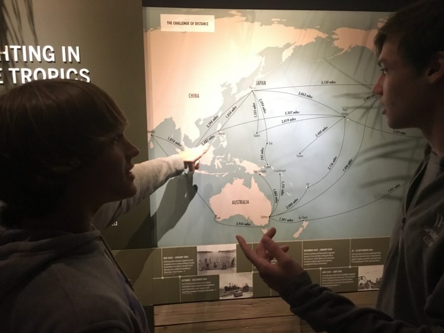 Students Reece Davis and Steven Wyatt discuss the distance from Japanese/American attacks. Photo by Stewart McCullough