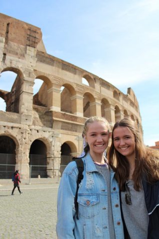 Mackenzie Shoemaker and Aubrey Scott Moak in front of the Coliseum.