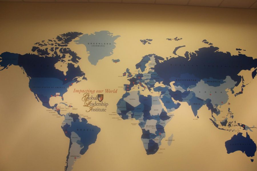 The map of the world in the Global Leadership Institute offices gives would-be travelers some locations to aim for.