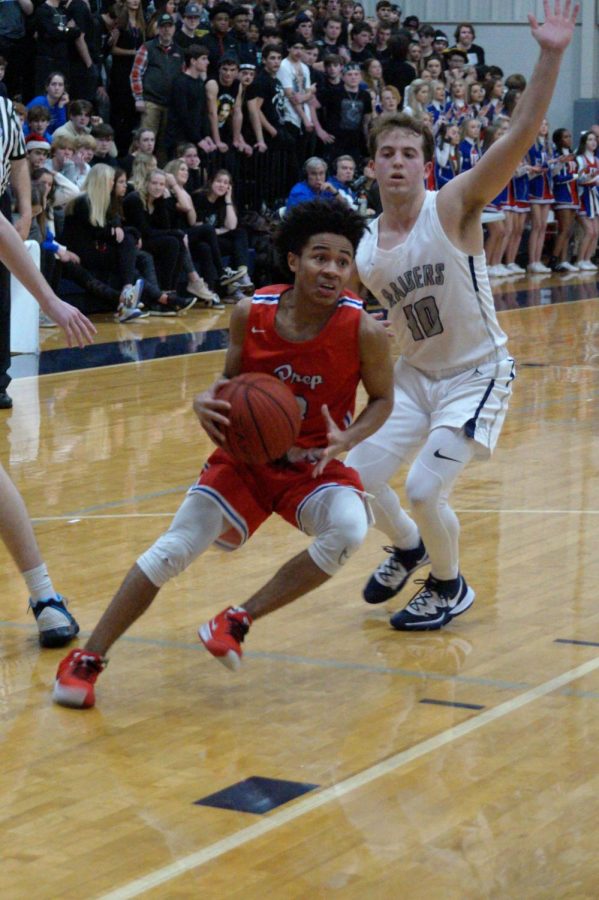 Cam Brent prepares to shoot a basket. 