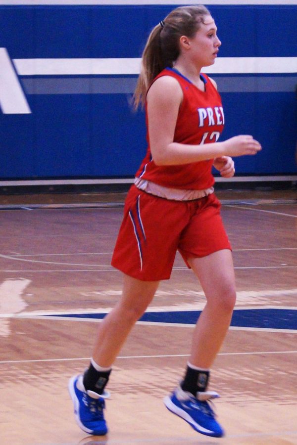 Olivia Smith jogs down the court. 