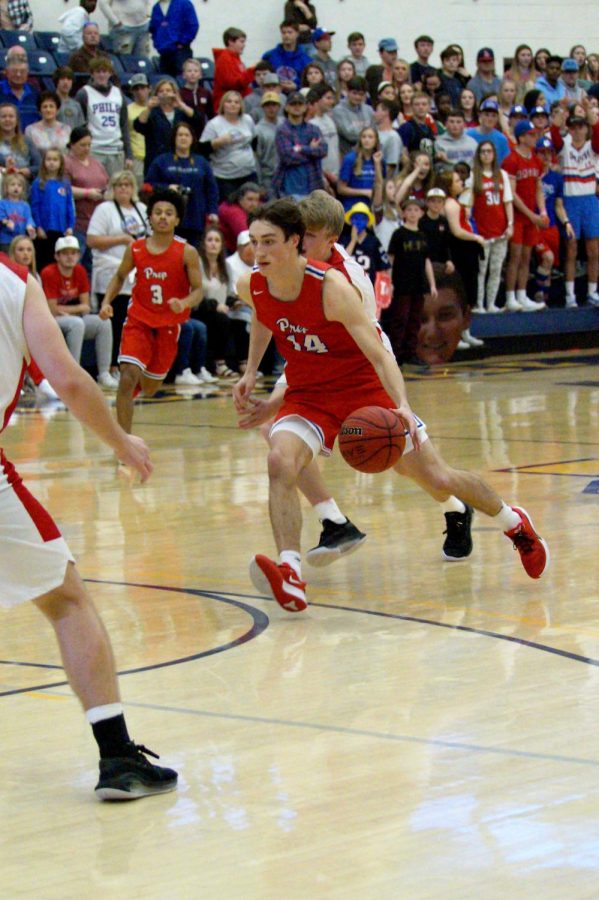 Senior Andrew Purvis driving in the lane in the championship game.