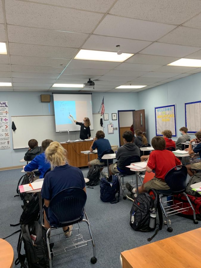 Ms. Ritchie teaching algebra to her ninth-grade students. 