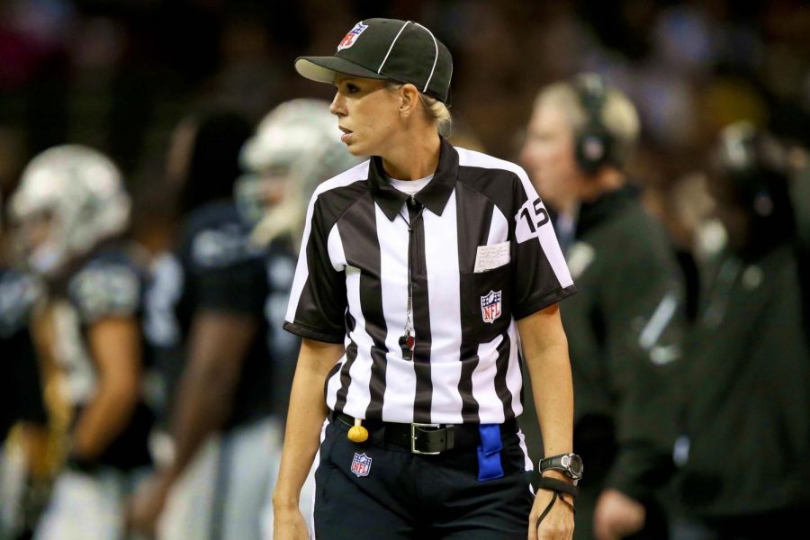 Sarah Thomas officiates one of her many NFL football games. Photo courtesy of NFL