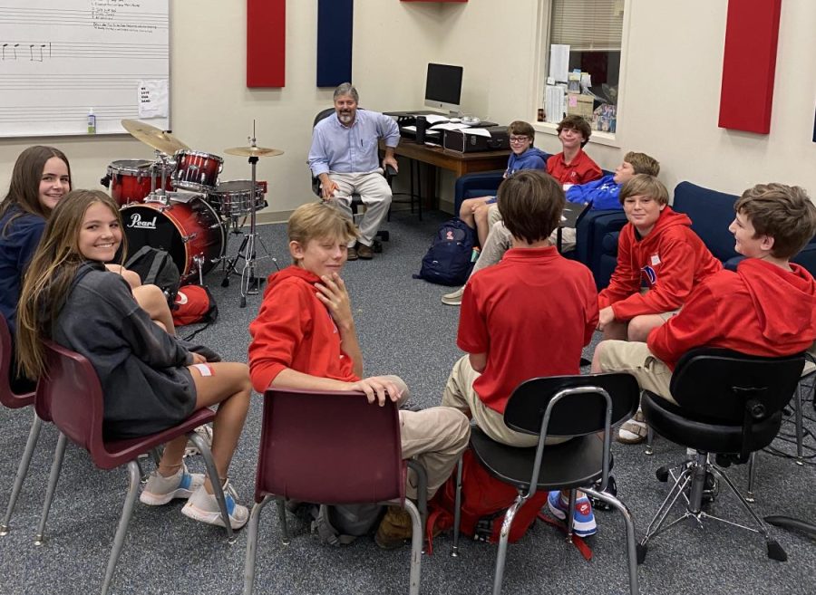Band director Mr. Steve Kincaid meets with the students who chose his book, Madeleine LEngles A Wrinkle in Time.