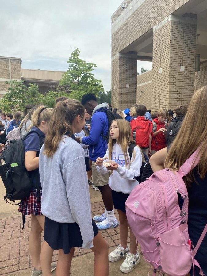 Students congregate on Patriot Avenue for an ice cream social after their book discussions.